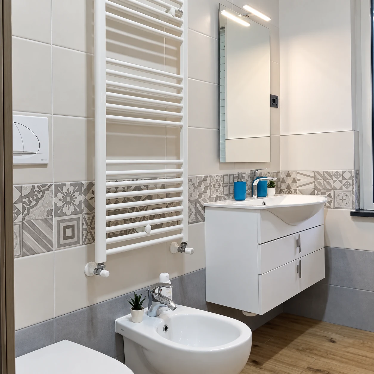 Bagno con lavabo e termoarredo